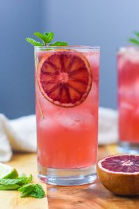 blood orange gin and tonics in 2 glasses