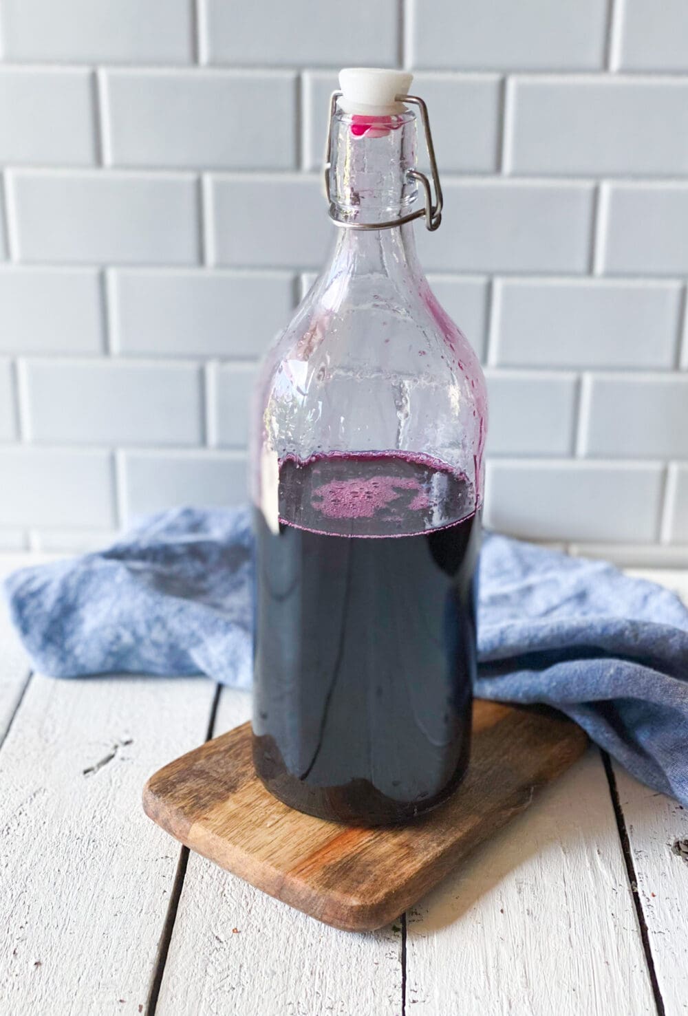 Blueberry simple surup in a large bottle