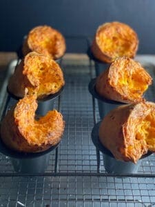 6 cheese popovers in a popover pan
