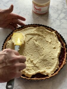 Almond Filling being put into tart