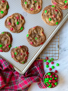 m&m chcolate chip cookies cooking on. cooking rack