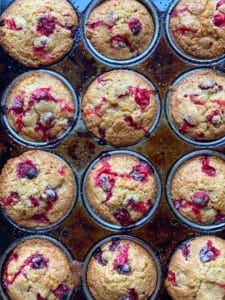 12 cranberry orange muffins in a pan