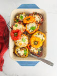 stuffed pellers in a pan with a red napkin