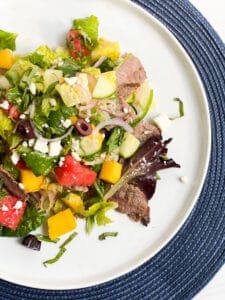 Mango and watermelon salad with steak