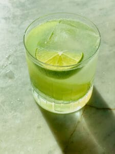 Cucumber martini on the rocks with sparkling water