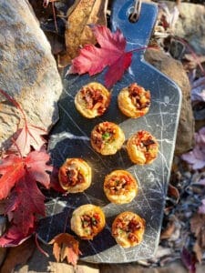 pecan and boursin tarts on a marble tray