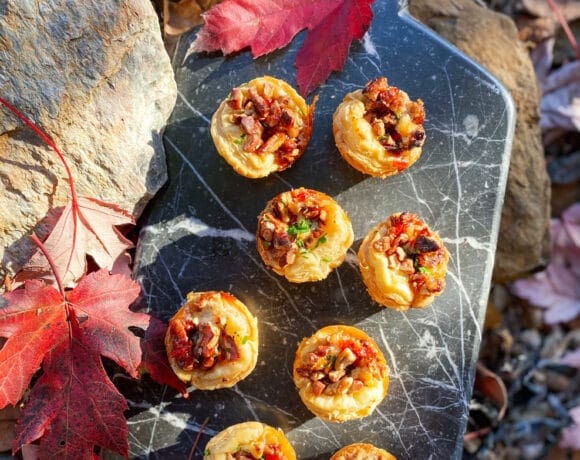 pecan and boursin tarts on a marble tray
