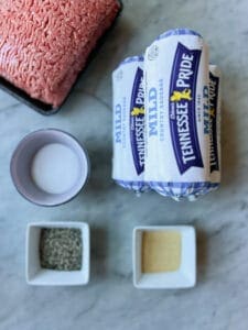 Ground beef, breakfast sausage, salt, pepper, garlic granules.