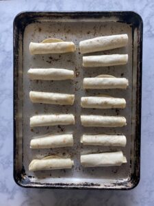 fish taquitos on a sheet pan