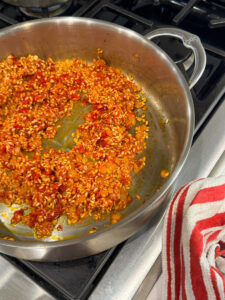 arbario rice and sundried tomatoes in a pan