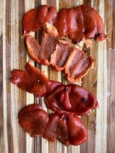 Roasted red peppers that have had the black skin and seeds removed