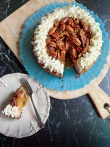 Caramel pecan cheesecake with slice out