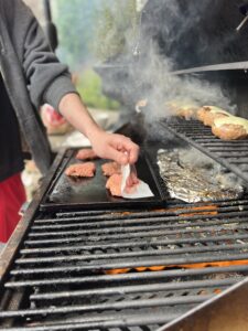 Ground Turkey Burger sliders on the griddle on the grill