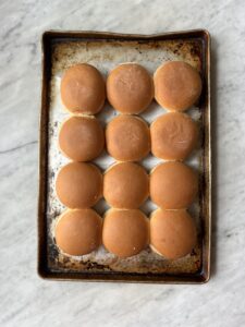 Slider buns on a cookie sheet