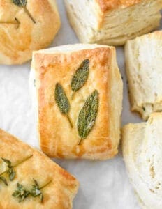 Rectangle shaped herb biscuits with herbs on top
