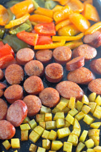 Kielbasa and peppers and potatoes on a Sheet-Pan-Dinner