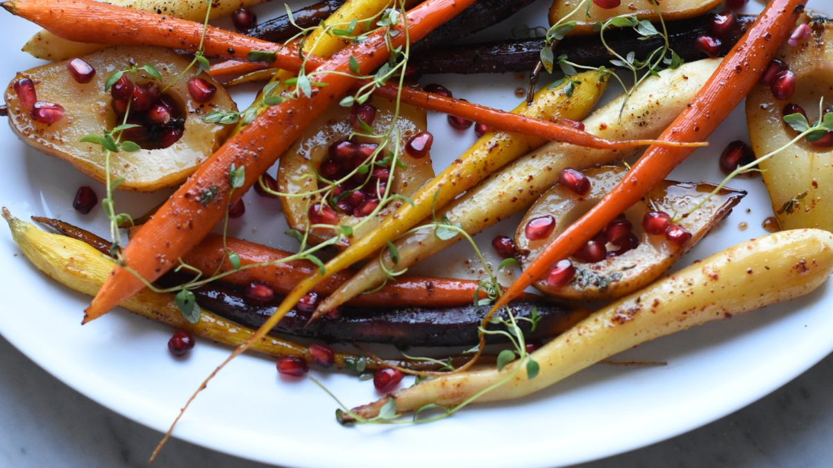 Rainbow carrots and pears on a plate