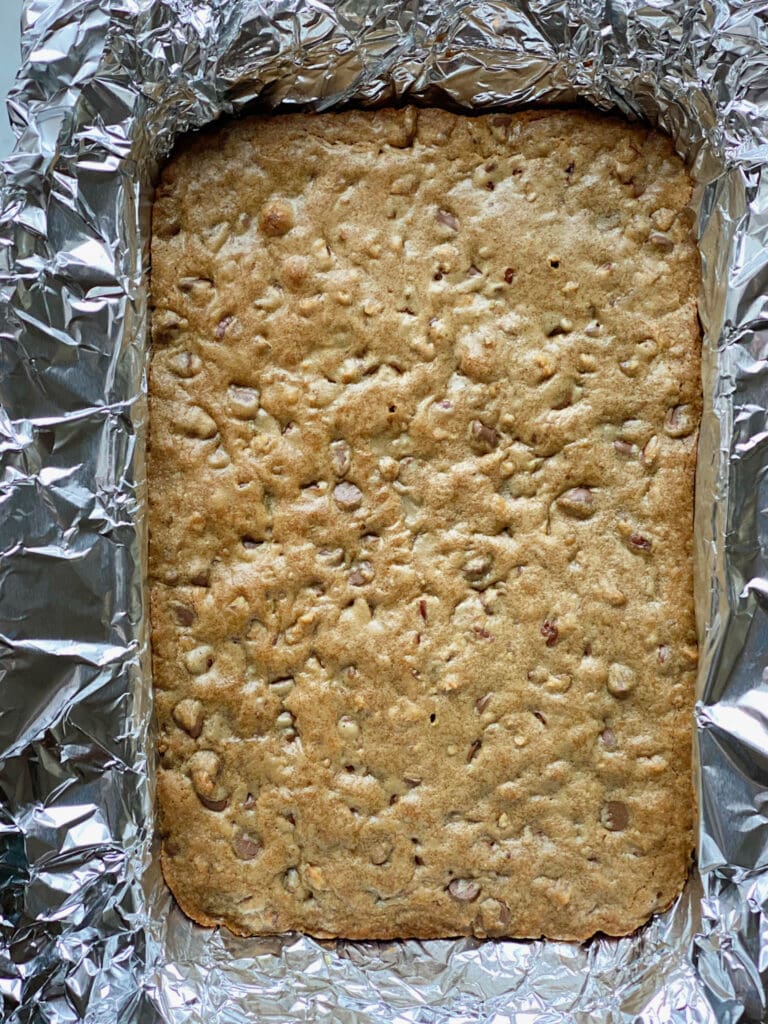 bourbon browned butter blondies with pecans and chocolate chips baked