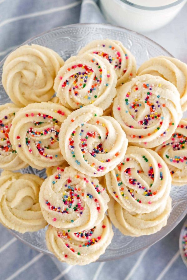 Butter cookies with sprinkles ona a plate