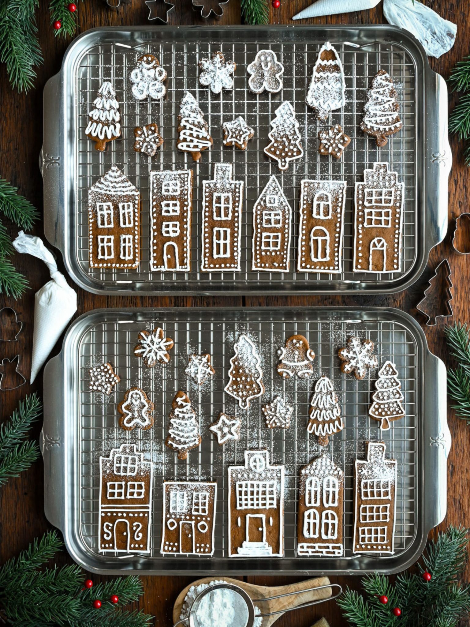 gingerbread cookies on a wire rack with icing