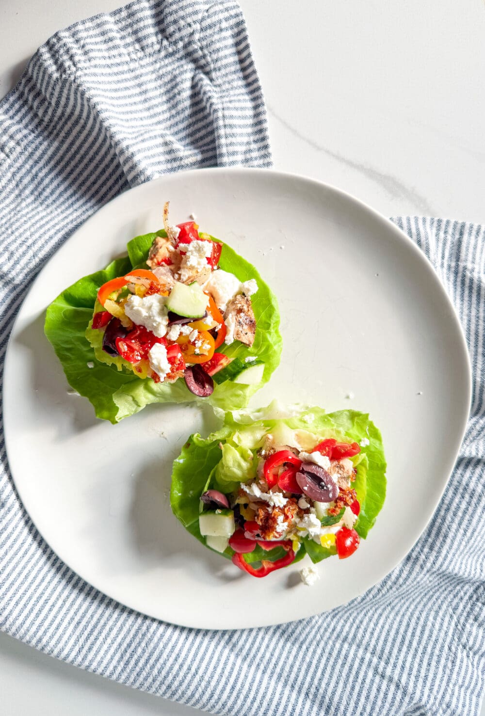 chicken thigh lettuce wraps on a plate