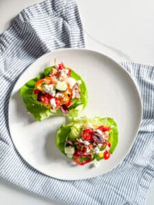 chicken thigh lettuce wraps on a plate