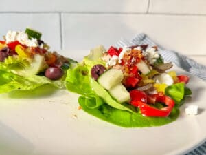 chicken thigh lettuce wraps on a plate