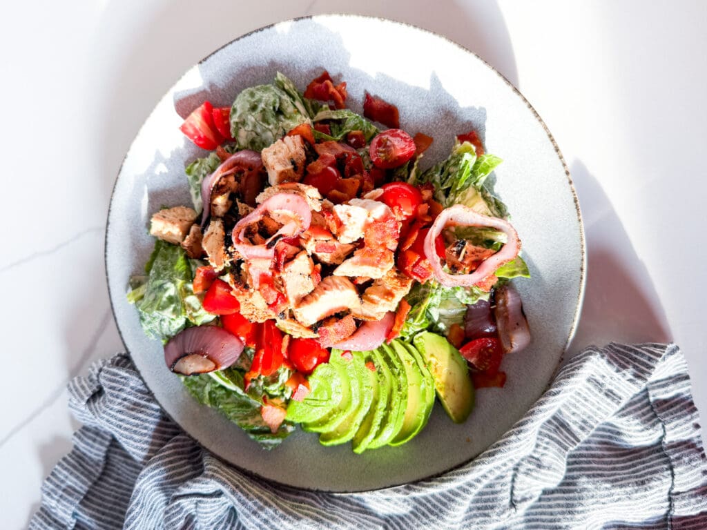 California Caesar Salad on a plate with no croutons