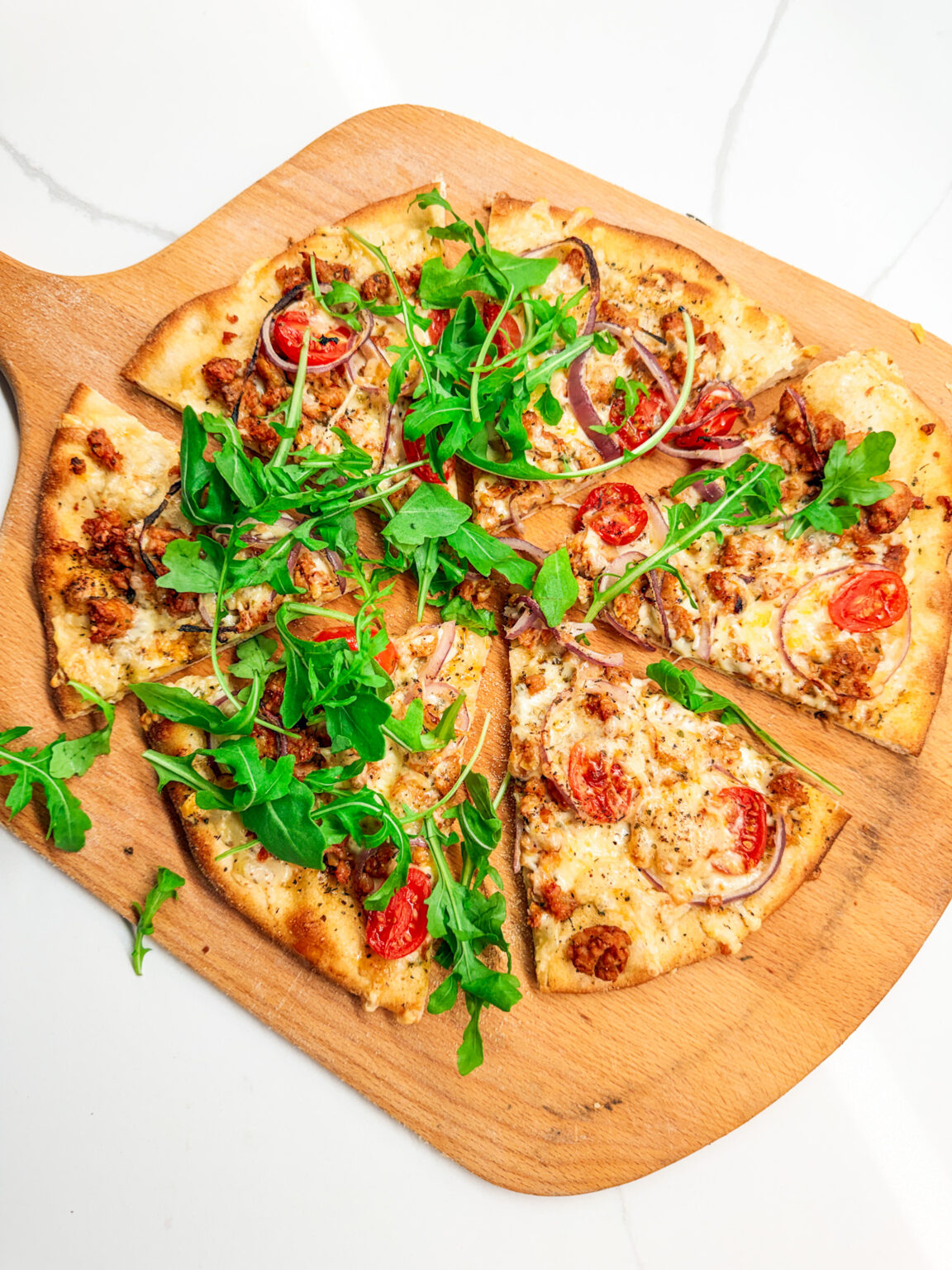 Chicken Sausage Pizza with arugula - The Perks of Being Us