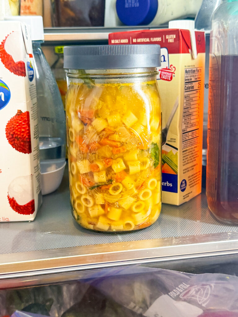 Italian Wedding soup in a mason jar in the fridge