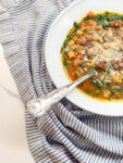 Vertical Wedding Soup with spoon and napkin