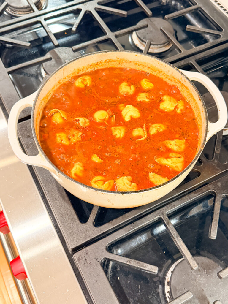 soup with tortellini on a stove
