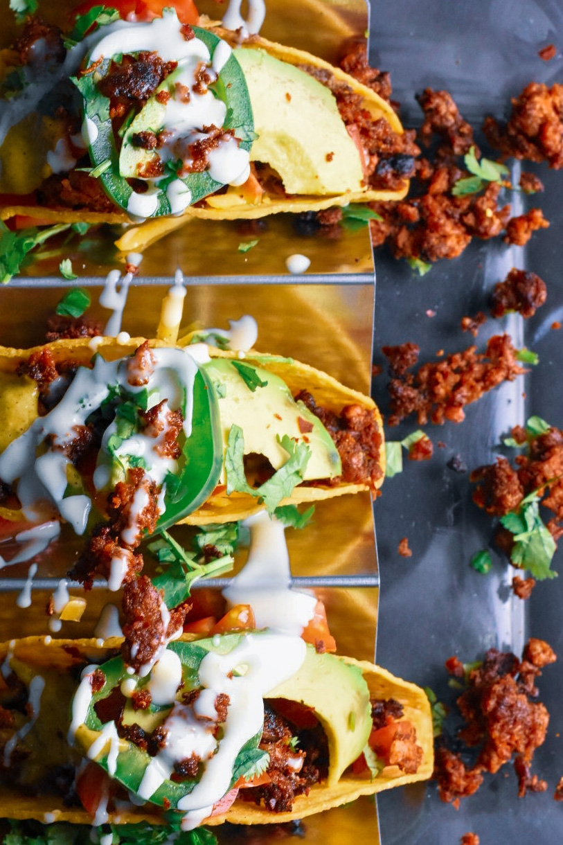 3 chorizo tacos with toppings