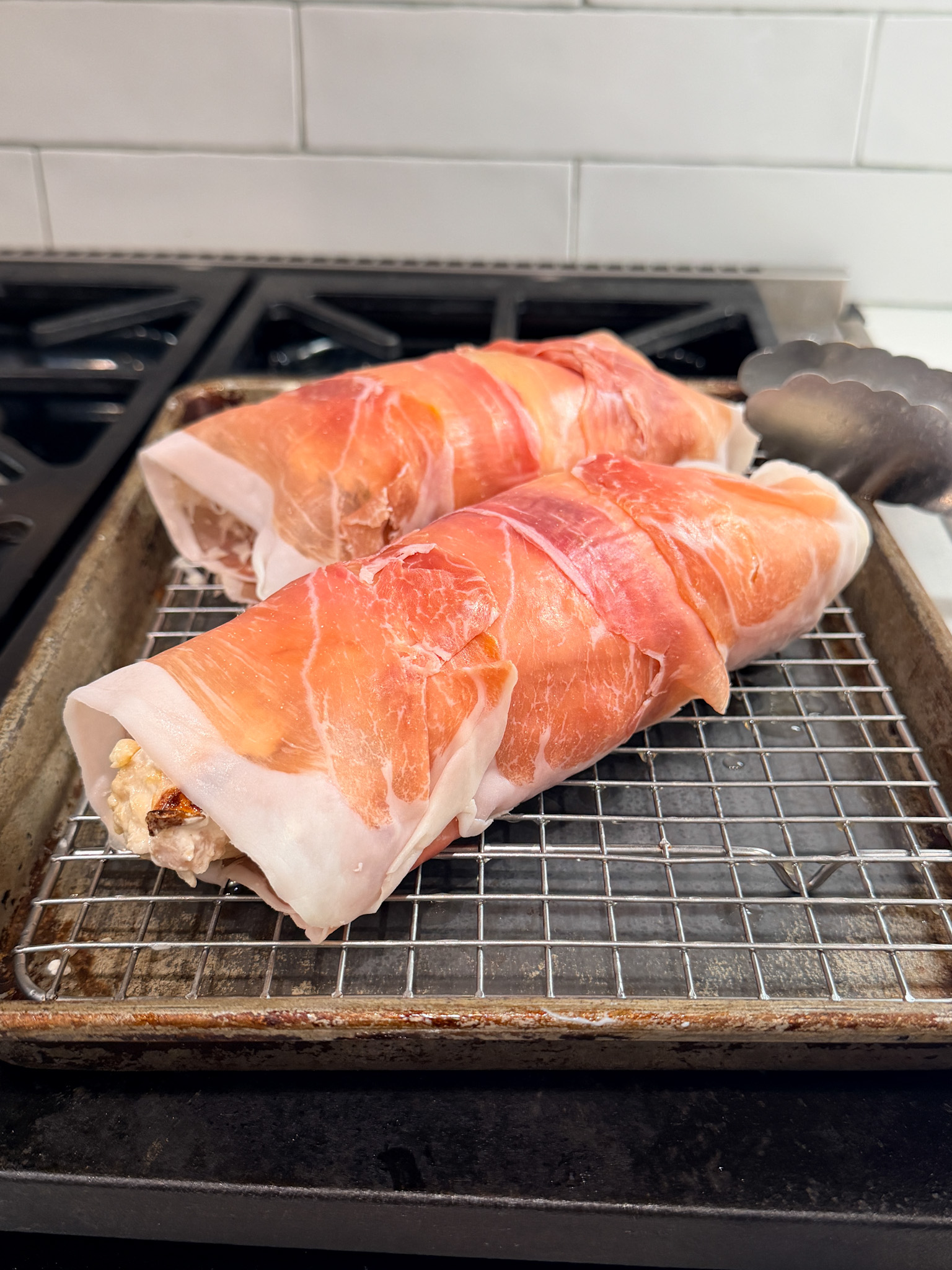 proscuiotto wrapped chicken before it is cooked